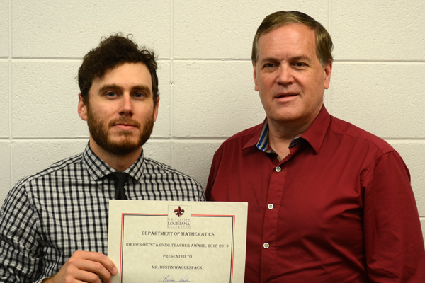 Justin Waguespack with Bruce Wade presenting his certificate